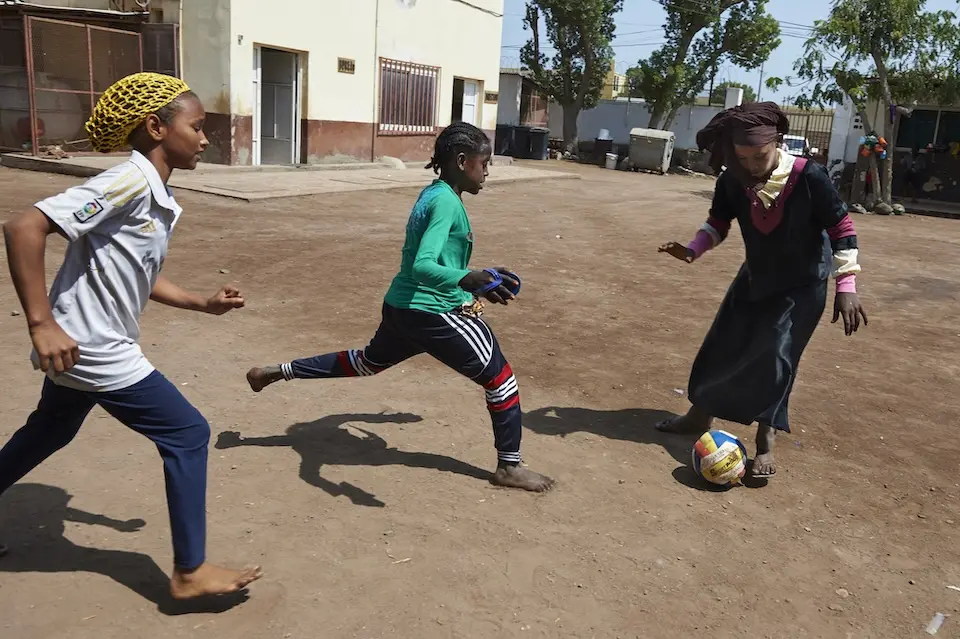 Kids play soccer at a UNICEF-supported learning center in Djibouti.