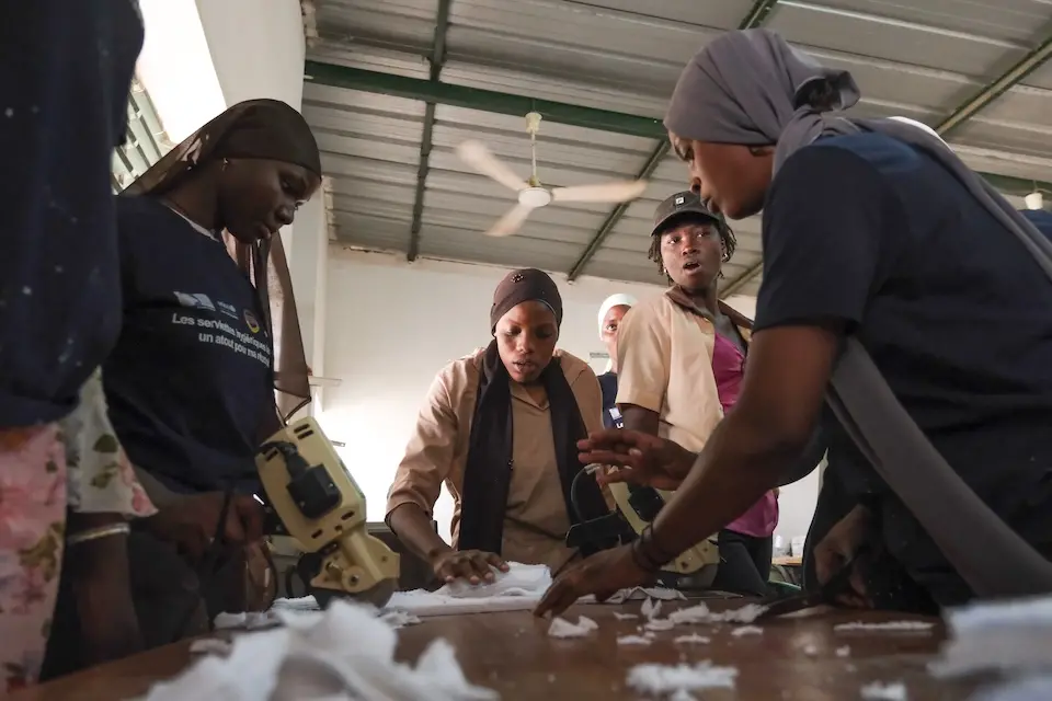 UNICEF-supported center in Senegal where girls and young women train to make reusable pads to support menstrual hygiene and earn an income.