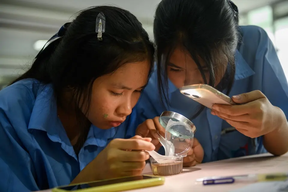 Two students in Thailand participate in STEM-focused education lessons