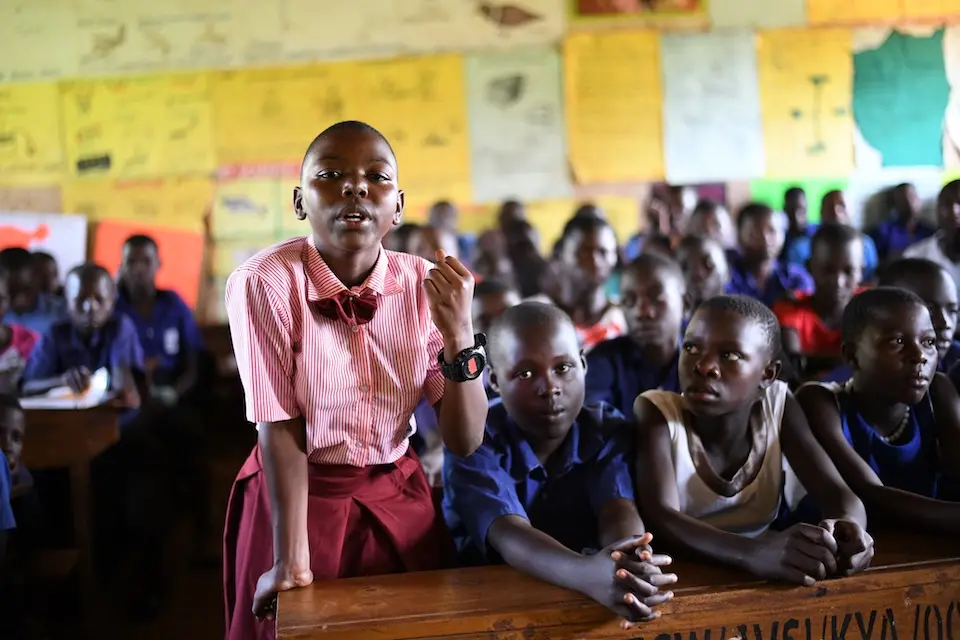12-year-old pupil in her classroom in Uganda where girls learn life skills thanks to a UNICEF-supported program.