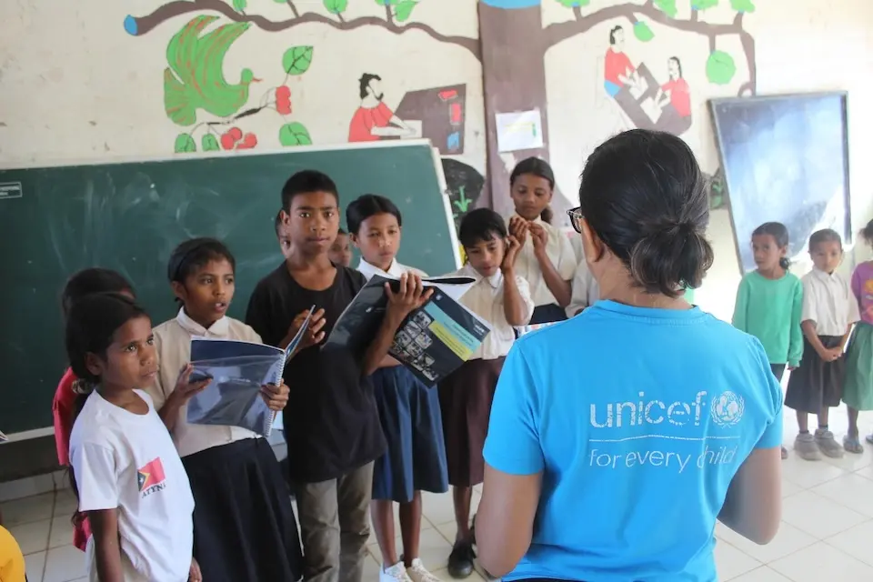 Yessy Octaviana Betty, an SBC Officer at UNICEF in Timor-Leste, teaches students at a school readiness program.