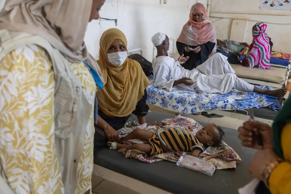 Children and adults suffering from cholera receive treatment in the isolation center at Turkish Hospital in Khartoum, Sudan.