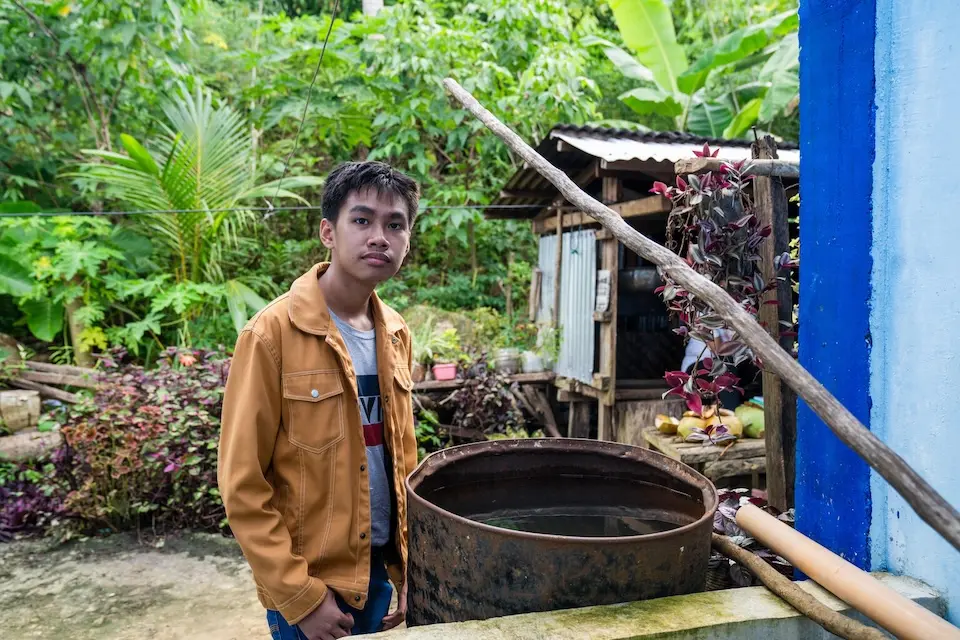 A high school student in the Philippines tries rainwater harvesting.