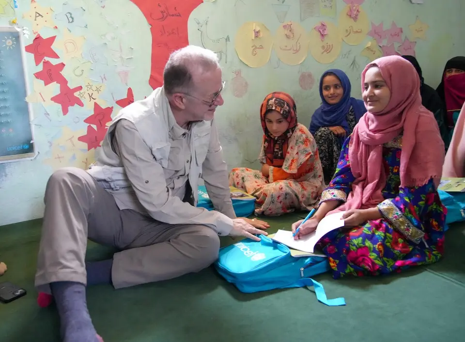 UNICEF Deputy Executive Director for Humanitarian Action and SupUNICEF's Ted Chaiban talks to a student in an accelerated learning class  in northern Afghanistan.