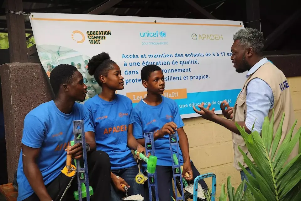 Students learn vocational skills in a nonformal education sessions run by UNICEF in Haiti.