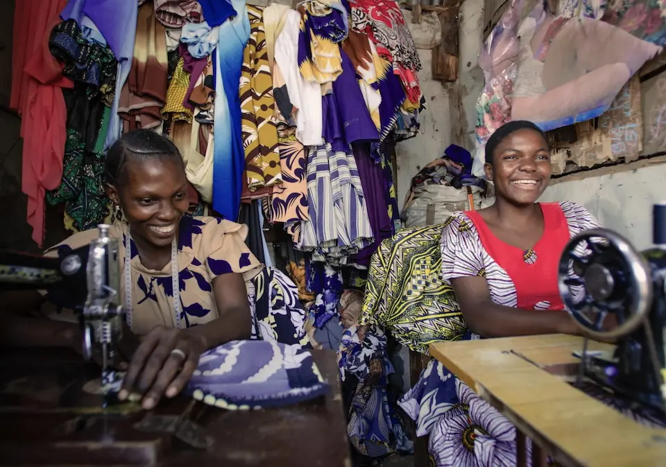 Antini, 17, sewing apprentice in Tanzania, with her mentor.