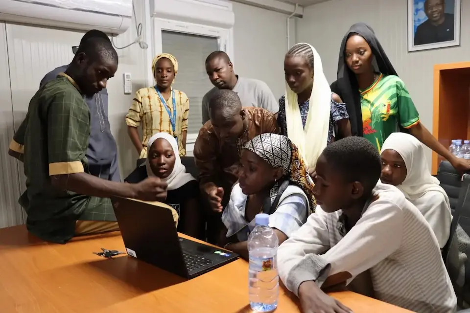 In Mali, a team of young people play an online video game that teaches disaster risk reduction.