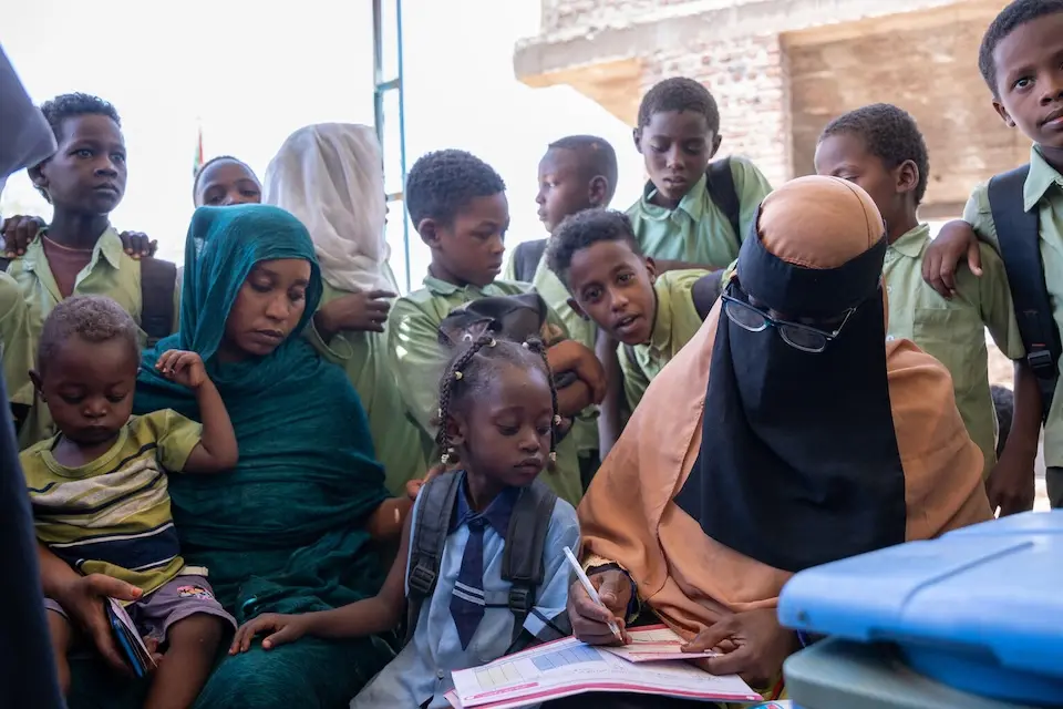 Children are vaccinated against measles and rubella at Alwihda health center in Al Jazirah state, Sudan.