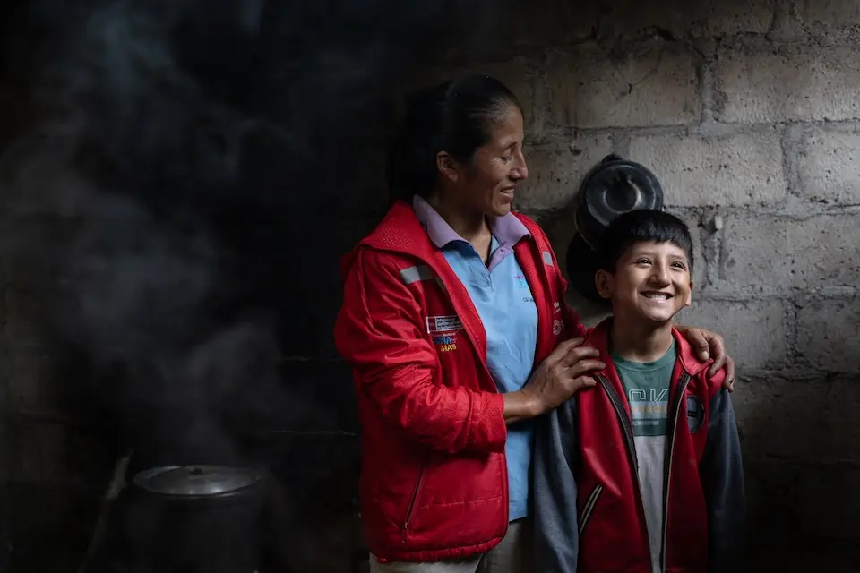 Hansel, 9, at home with his mother in Ayacucho, Peru, on Sept. 7, 2025.