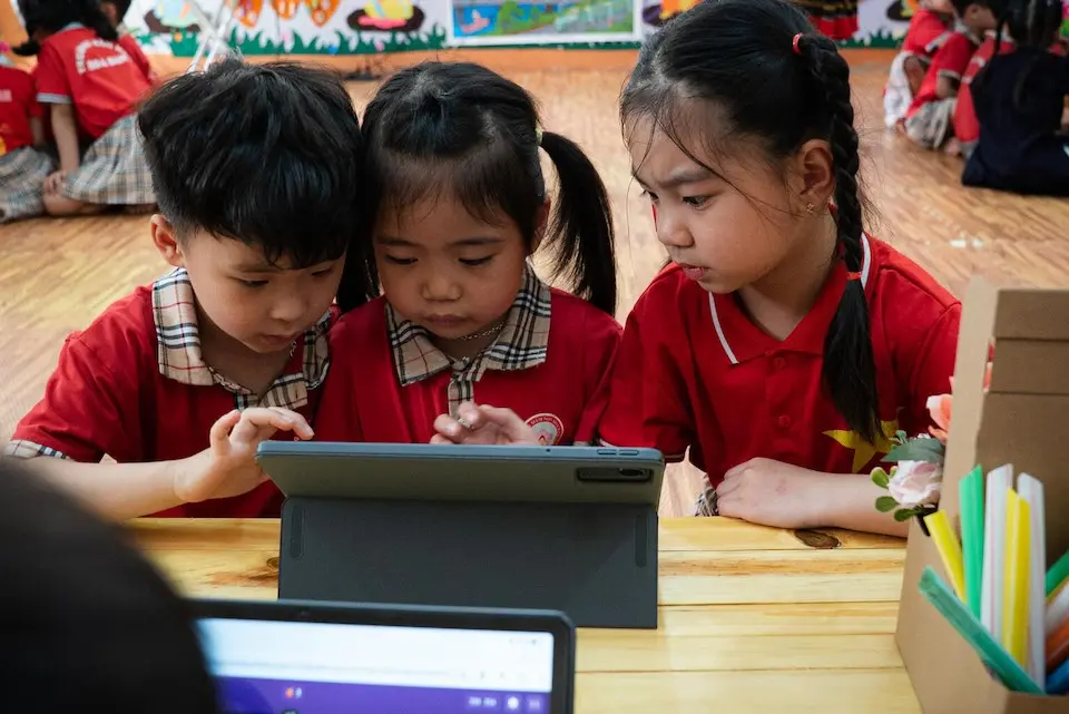 Students at a preschool in Bao Thang District, Lao Cai Province, Vietnam, gather for a special class to explore tablet-based learning supported by UNICEF.©UNICEF/Vu Le Hoang/UNI790774