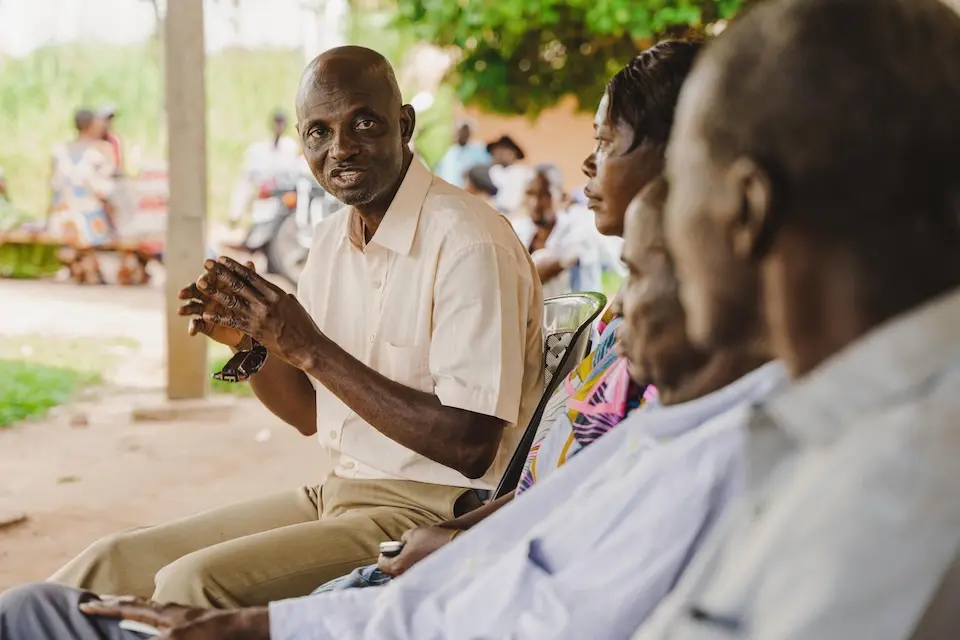 A traditional chief in Luandanda, near Kananga city in Kasai-Oriental province, DR Congo, speaks with villagers about the dangers of child marriage.