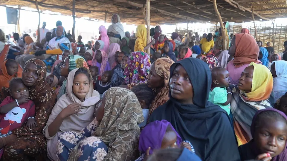On Jan. 7, 2026, mothers and caregivers bring their children for immunization during the UNICEF-supported measles and rubella catch-up campaign in Tawila, North Darfur, Sudan.