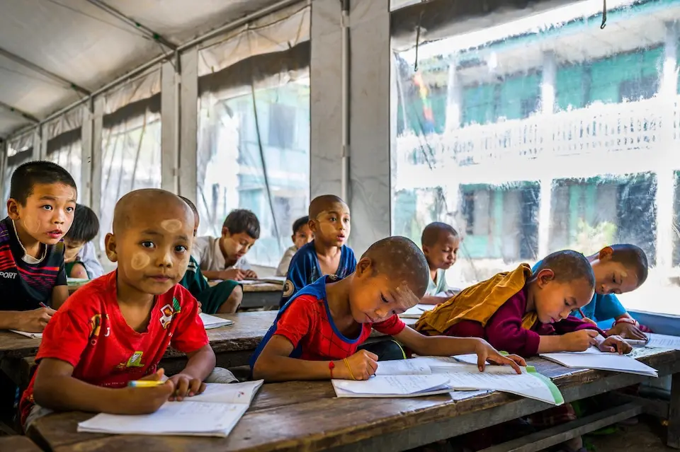 Orphaned and displaced students attend a UNICEF-supported school tent following an earthquake in Myanmar