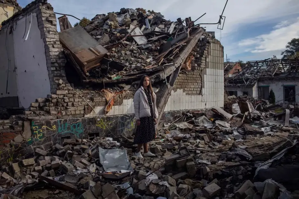 In Ukraine, a 16-year-old girl stands in the ruins of her school, Zhytomyr school No. 25.