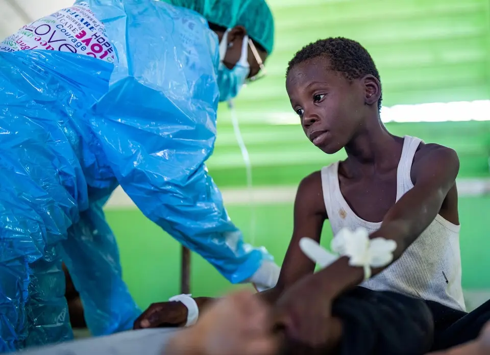 A child suffering from acute watery diarrhea receives care at a UNICEF-supported hospital in Haiti.