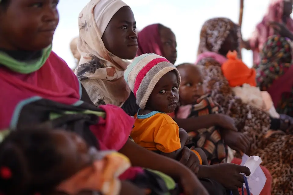 In North Darfur, Sudan, mothers bring their young children to a UNICEF-supported mobile clinic to be screened and treated for malnutrition.