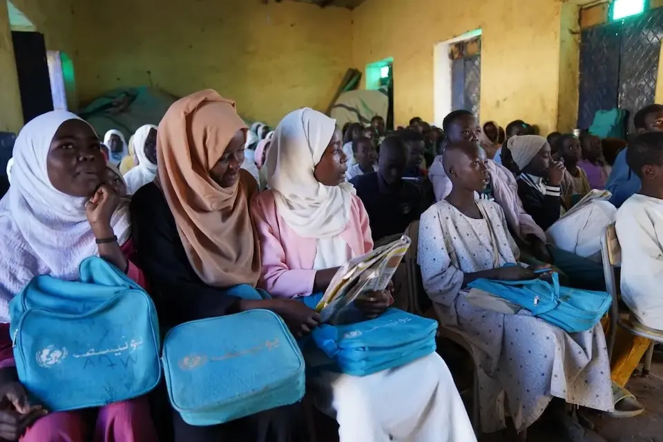 Students with UNICEF backpacks fill a crowded classroom in Rokero, Central Darfur, Sudan.