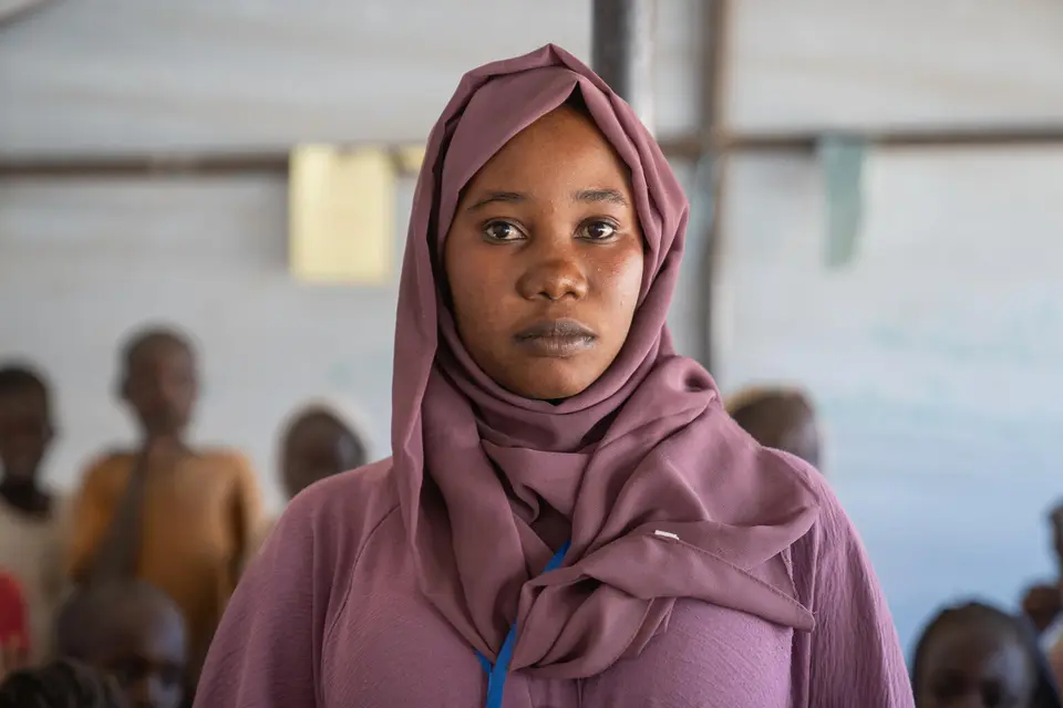 A volunteer at a UNICEF child-friendly space in Tawila, North Darfur, Sudan.