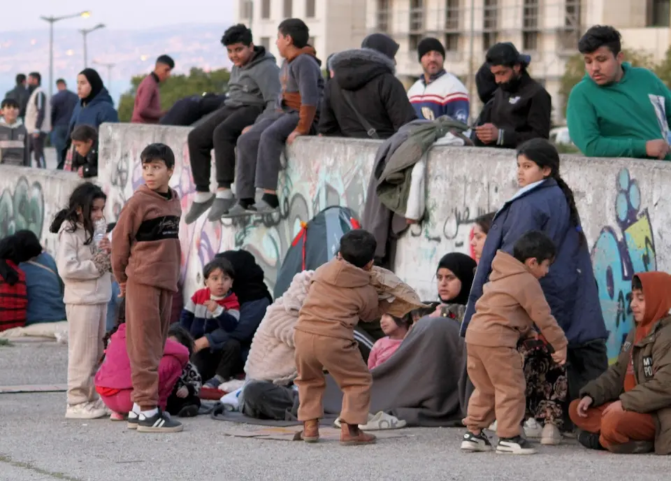 Families fill the streets of Beirut on March 5, 2026 following evacuation orders as the conflict escalates.