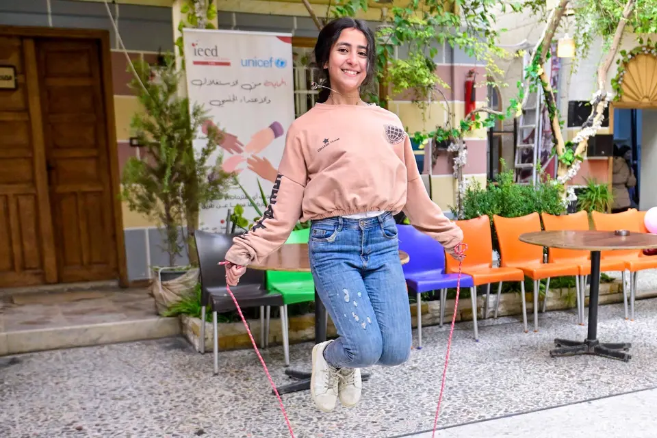 A 12 year old girl jumps rope in the yard of a UNICEF-supported youth-friendly space in Rural Damascus, Syria. 