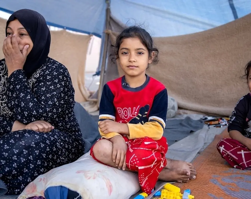 Asia, center, and her family were displaced from their home by ongoing conflict in Beirut, Lebanon.
