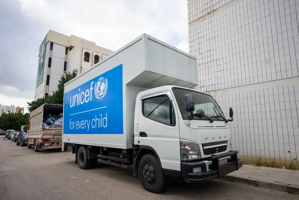 A UNICEF truck full of winter clothing kits and blankets for children displaced by war in Lebanon.