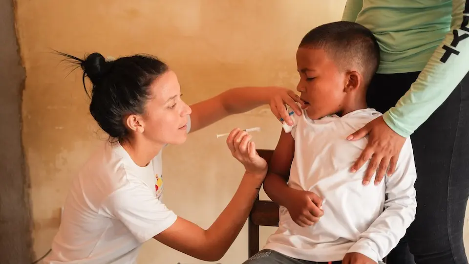 A 5-year-old boy is vaccinated at a UNICEF-supported health facility in San Carlos, Venezuela.