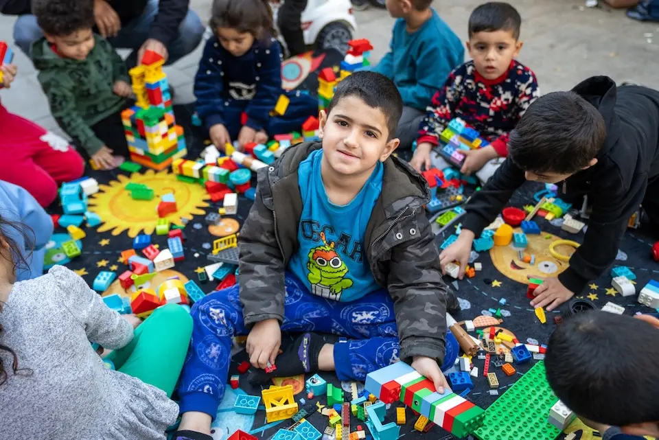 Children displaced by conflict in Lebanon play with toys at Omar Faroukh School in Beirut on arch 17, 2026.