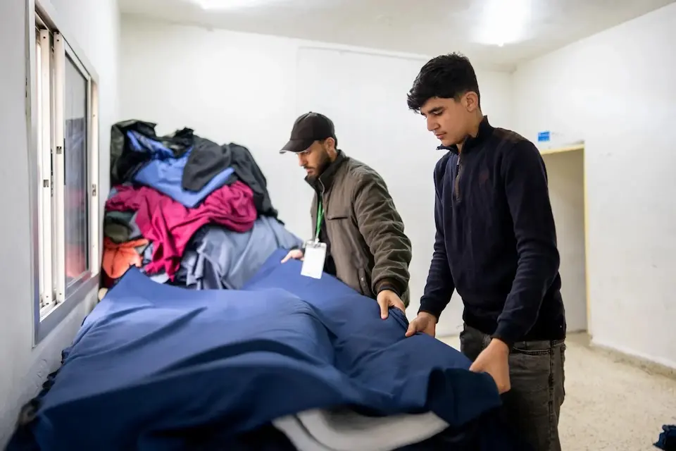 Youth workers make clothing and sleeping bags for children and families displaced by war in Lebanon.