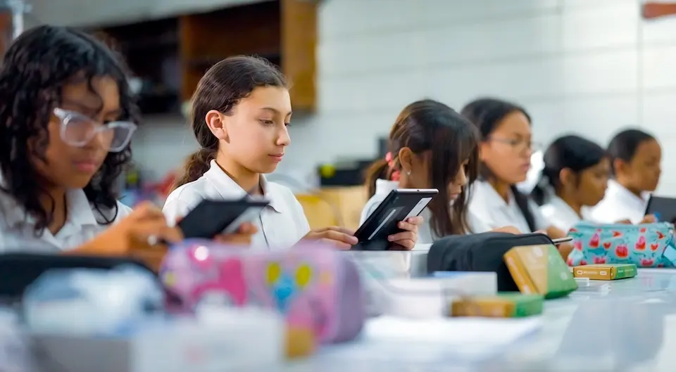 Students in a classroom in Honduras take part in a pilot program supported by UNICEF.