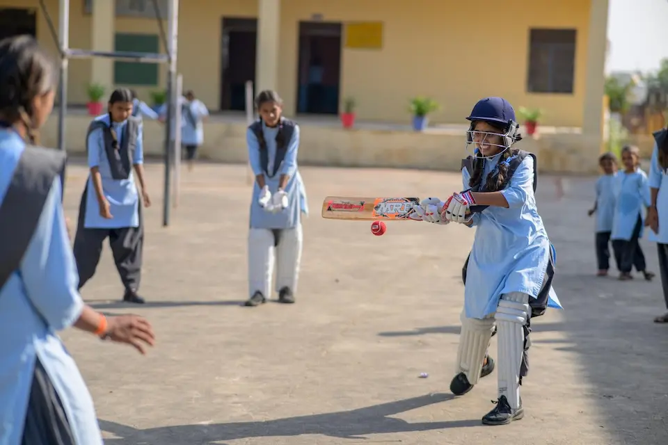 Girls play cricket at a secondary school in Rajasthan, India.