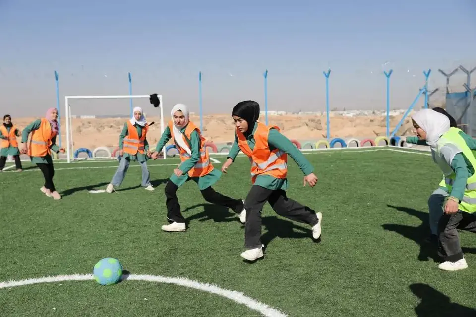 Girls playing on the soccer fields at the Za’atari camp in Jordan.