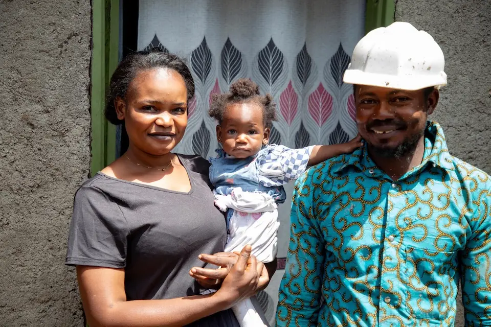 A mother, father and their infant daughter at home in Ituri province, DRC, epicenter of May 2026 Ebola outbreak.