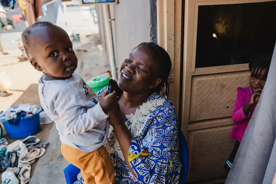 A mother and her child in Ituri province, DR Congo, recovered from Ebola virus disease after receiving care at a UNICEF-supported treatment center.