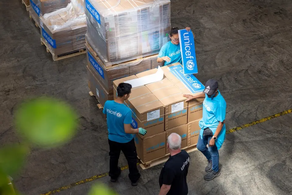 Staff at UNICEF's Global Supply hub in Copenhagen prepare supplies for delivery to Venezeula following massive earthquakes in June 2026.
