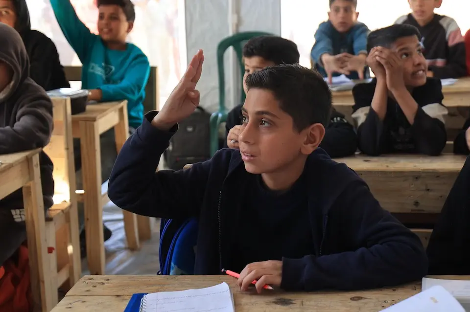 Children are continuing their education in a UNICEF-supported Temporary Learning Center — a safe space designed to help them learn, play and rebuild routines. 