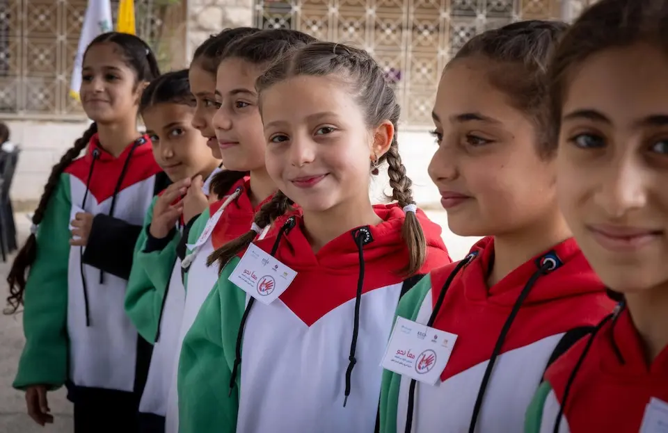 Children at a school in Hebron participate in activities as part of a UNICEF-supported violence-prevention campaign.