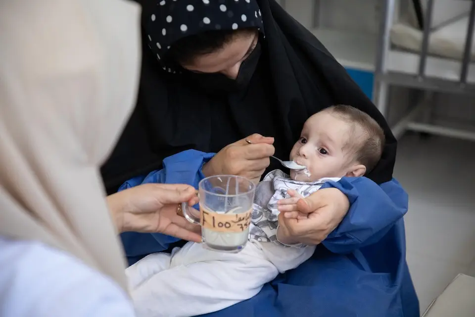 A severely malnourished baby is fed therapeutic milk at a UNICEF-supported hospital in Afghanistan on Aug. 29, 2026.