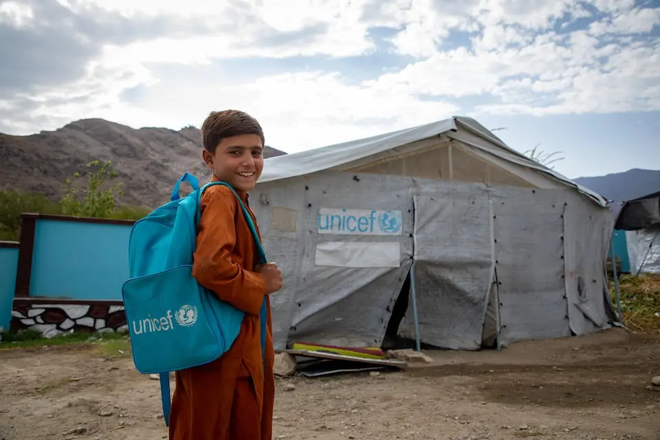 A first-grade student attends a UNICEF-supported  primary school in Afghanistan. © UNICEF / UNI876838 / Muzamel Azizi