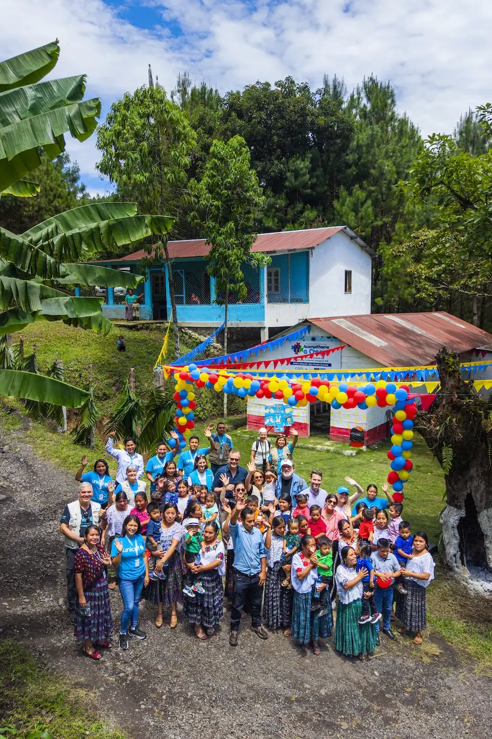 Community members outside a UNICEF-supported early childhood development teacher training center in Guatemala.