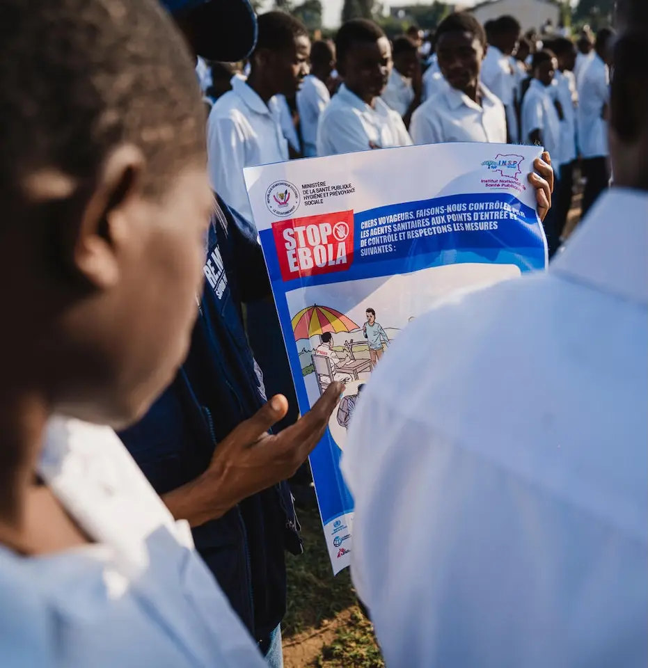 Students in DR Congo view information about how to stay safe from Ebola.