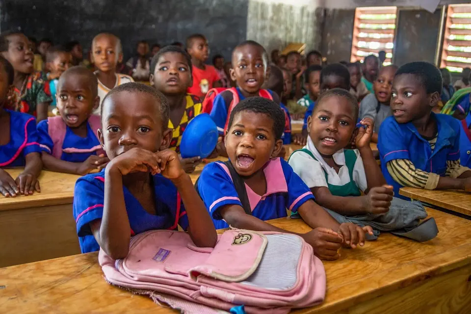 Students set at their desks provided by the K.I.N.D. Fund in a primary school in Malawi.
