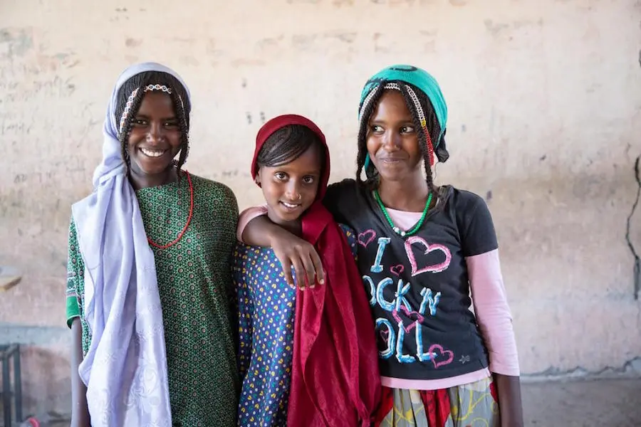 Displaced by conflict in northern Ethiopia, 11-year-old Asya, center, and her family fled to Chifra in Afar region. Displaced by conflict in northern Ethiopia, 11-year-old Asya, center, and her family fled to Chifra in Afar region.