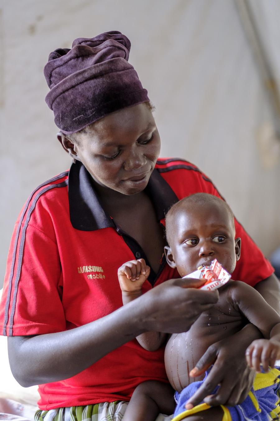 A recently arrived refugee from South Sudan feeds her baby in Bidi Bidi Refugee Settlement in Yumbe district, Uganda.