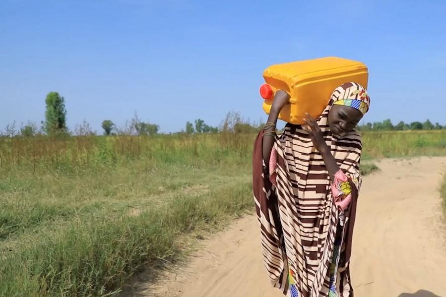 In northeast Kenya's Bauchi state, 13-year-old Uzzaya is late to school every day because she has to fetch her family's water supply from a faraway water source. 