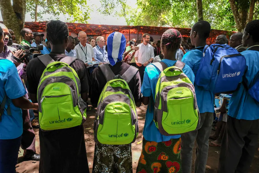 On April 17, 2018 in Yambio, South Sudan, children released from armed groups receive a "reintegration pack" filled with supplies from UNICEF to support their transition back into the community. On April 17, 2018 in Yambio, South Sudan, children released from armed groups receive a "reintegration pack" filled with supplies from UNICEF to support their transition back into the community.