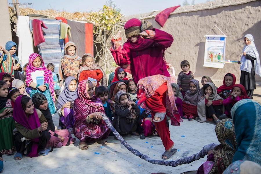 Children play games at a UNICEF-supported Child-Friendly Space in Afghanistan's Nangarhar Province, near the border with Pakistan. 