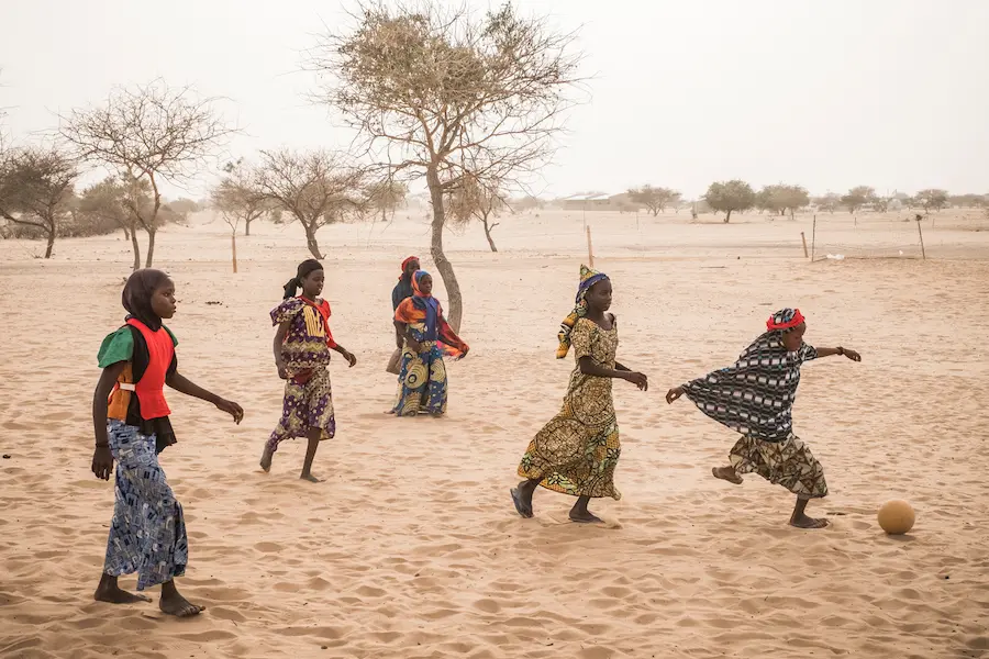 Nigerian refugees displaced by Boko Haram militants play football in Daresalam refugee camp, Lake Region, Chad, Thursday 20 April 2017. Nigerian refugees, boko haram, football, soccer, chad, unicef