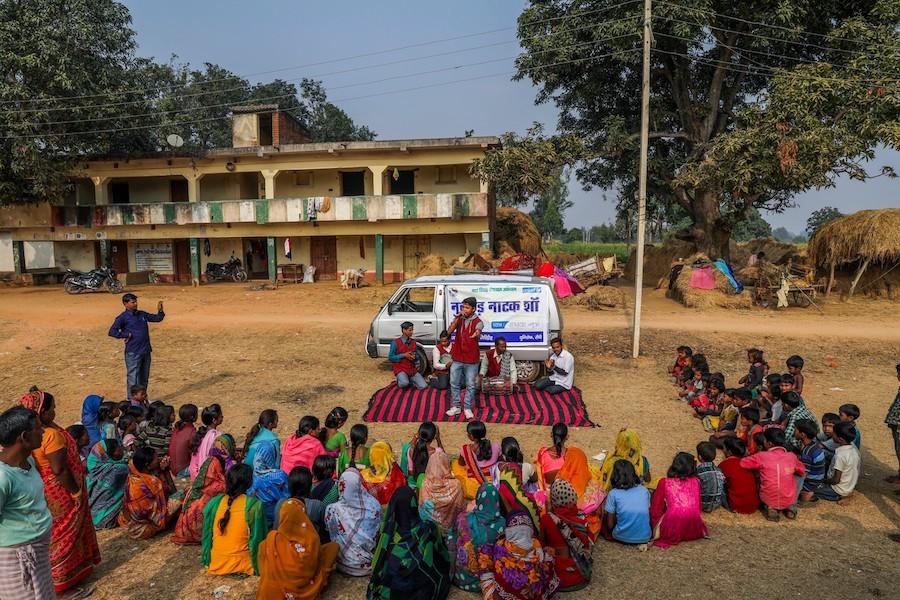 In the village of Madhwa in India's Jharkhand state, where 6 out of 10 girls are married before age 18, residents watch a play about the negative impact of child marriage. 