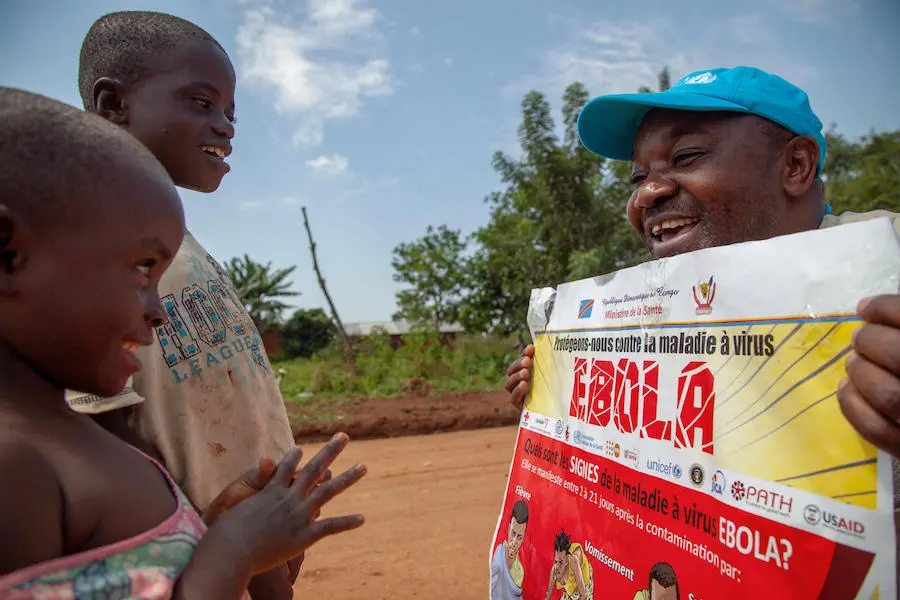 After an Ebola outbreak was announced in August 2018, a UNICEF WASH officer teaches children the importance of handwashing near Mangina, North Kivu, the Democratic Republic of the Congo. unicef, handwashing, public health